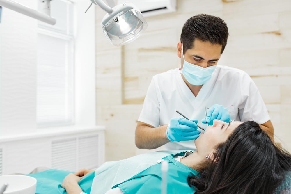 understanding the dental health benefits of fluoride treatment